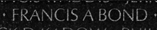 Bond's name inscribed in the wall